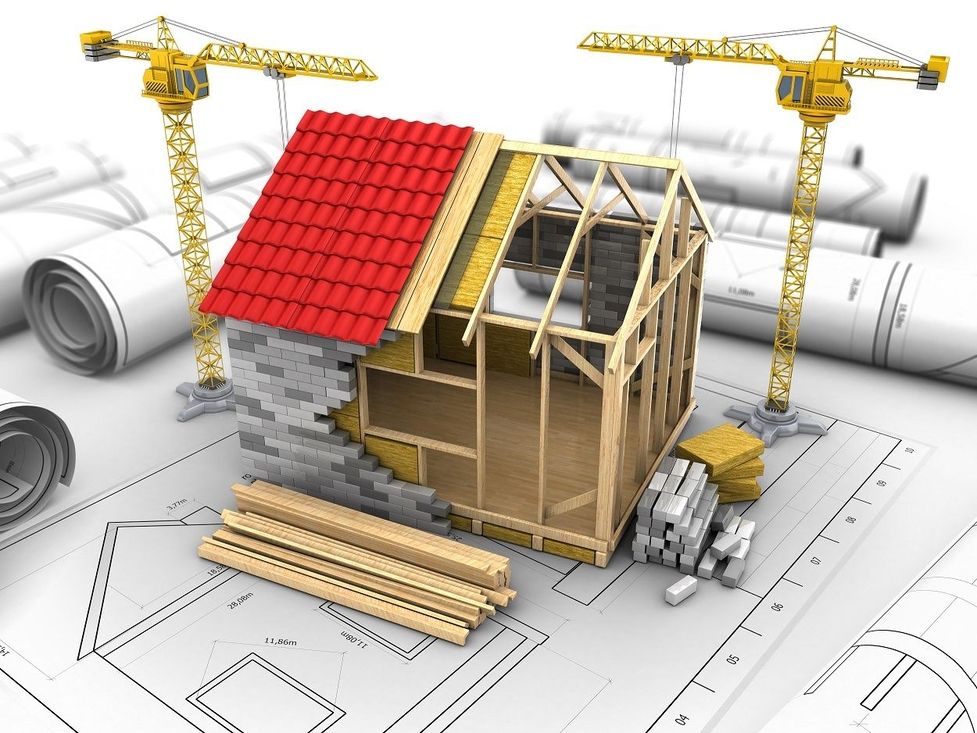 3D-Grafik eines Hauses auf Bauplänen